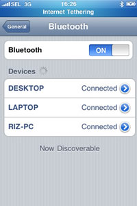 iPhone 3G screenshot: Settings > General > Bluetooth > Bluetooth ON : Devices : DESKTOP Connected LAPTOP Connected RIZ-PC Connected. Now Discoverable.