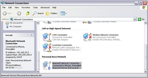 Windows XP > Network Connections : Bluetooth Network Connection Connected to iPhone, Firewalled, IP Address, Subnet Mask, Assigned by DHCP, Role : Personal Area Network Client, Physical Address (iPhone MAC address 00-25-00-xx-yy-zz)